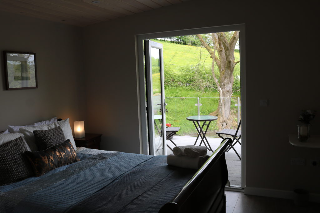 Romantic Lodge Kite's Nest Bedroom and Patio view